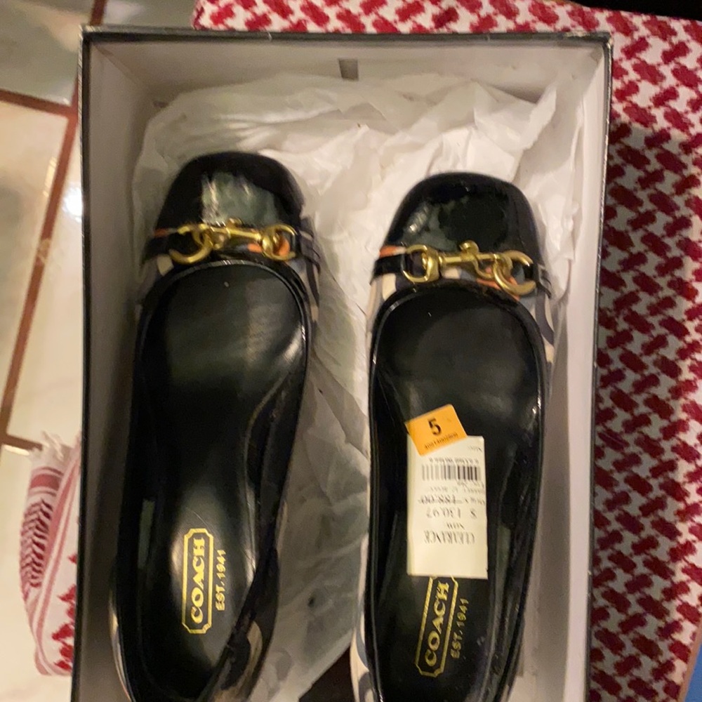 Coach used black printed size 5 shoes